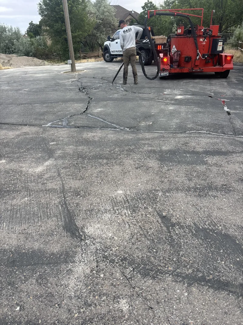 Crew performing crack sealing work