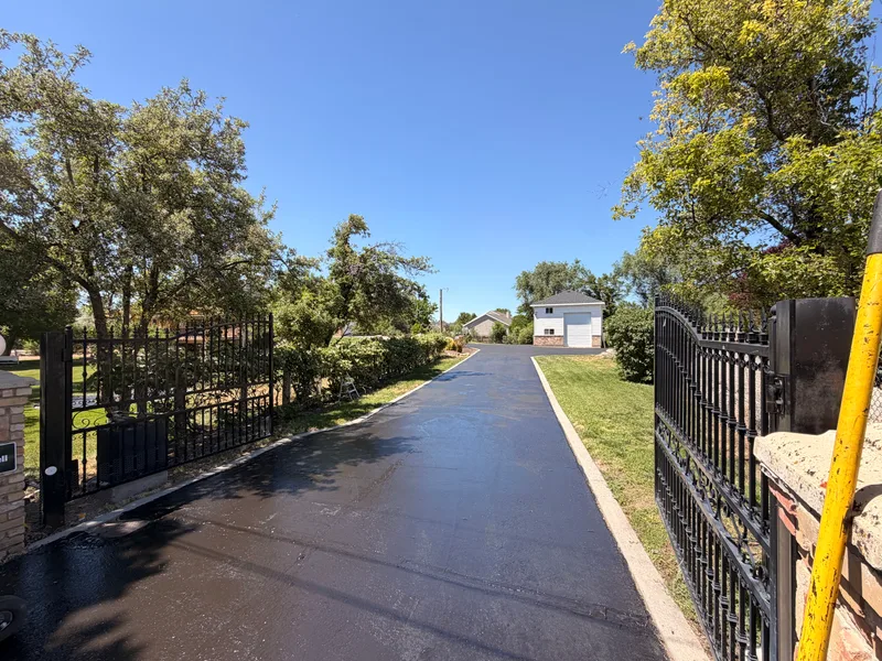 Freshly sealcoated gated private road